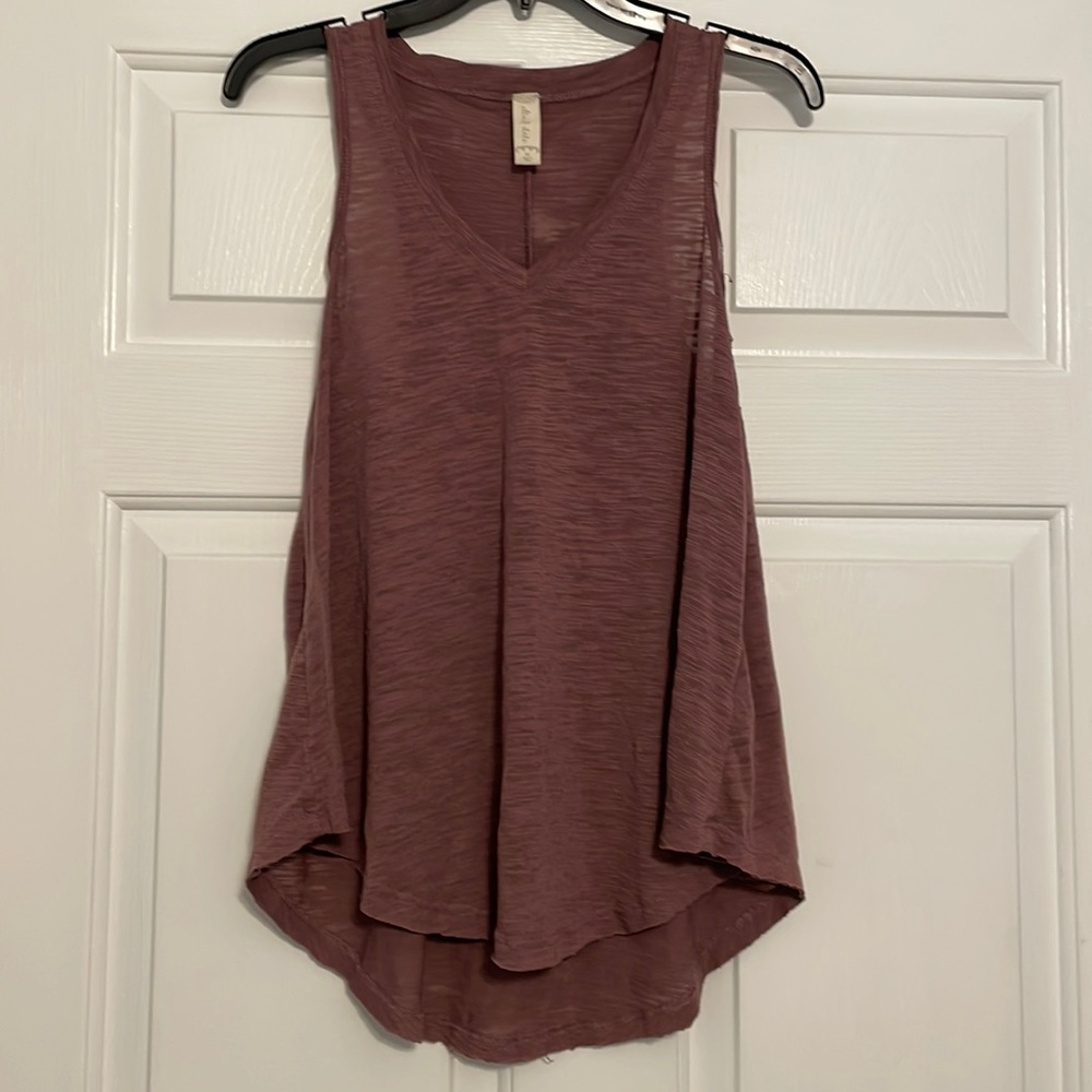 Burgundy distressed tank.